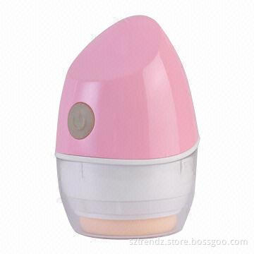 Battery operated powder puff, two-speed, 360° vibration to make foundation go on smooth